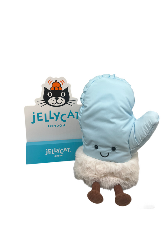 A blue ski mutton with a white fur cuff, smiley face and little brown corduroy legs