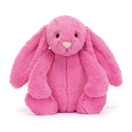 Jellycat medium hot pink bunny with floppy ears.