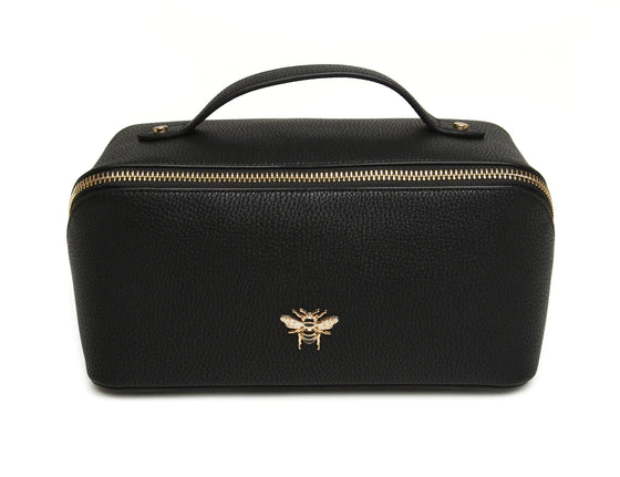 
Keep all your beauty essentials in order with this Black luxurious mini makeup bag. With gold trimmings and a beautiful gold Bee, this bag opens wide to reveal two compartments with a little inner pocket.

W18cmx H9.5cm x D9.5cm