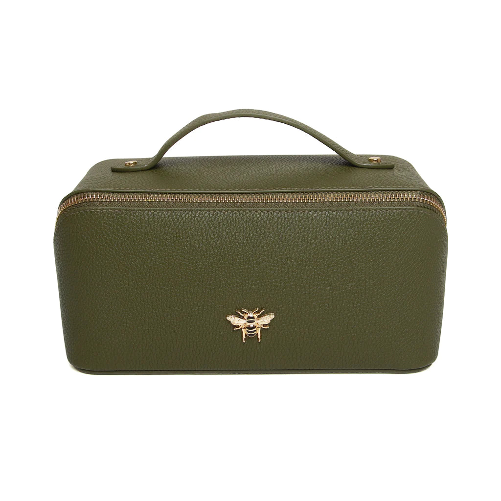 olive green leather makeup bag with gold trimmings, a handle, two compartments inside and a gold bee on the front 