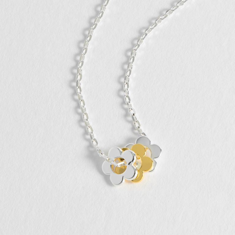 Silver chain with three gold and silver flowers