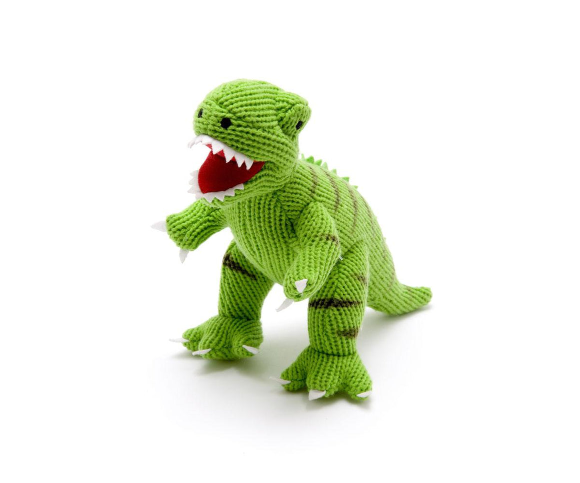 green knitted t rex with wide red mouth and white teeth and black stripes , stood up roaring