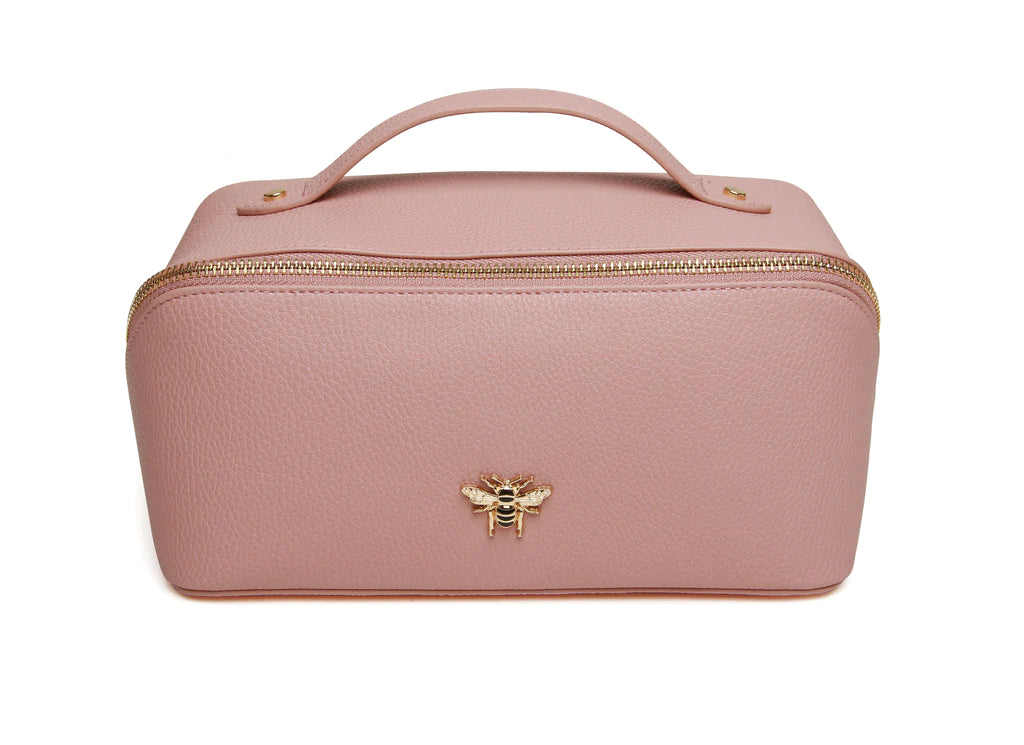 Keep all your beauty essentials in order with this Pale Pink luxurious mini makeup bag. With gold trimmings and a beautiful gold Bee, this bag opens wide to reveal two compartments with a little inner pocket.

W18cmx H9.5cm x D9.5cm