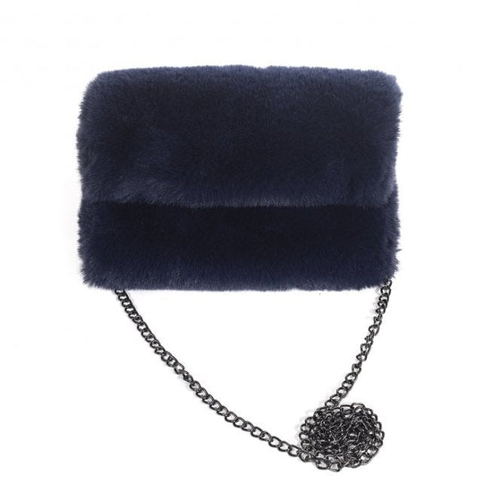 
A beautiful navy faux fur handbag with elegant  metal chain.

Zip fastening with poppers for added security.

20cm x 25cm 

