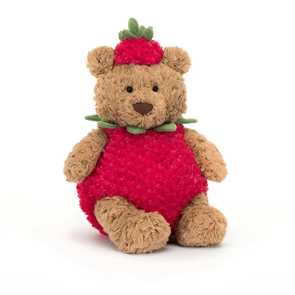 brown fluffy bear, with a red fluffy strawberry outfit and hat. 