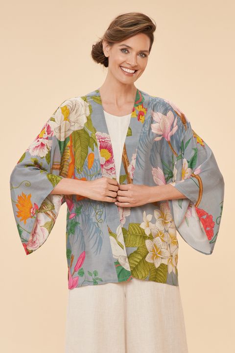 Powder kimono lavender style jacket with tropical design.