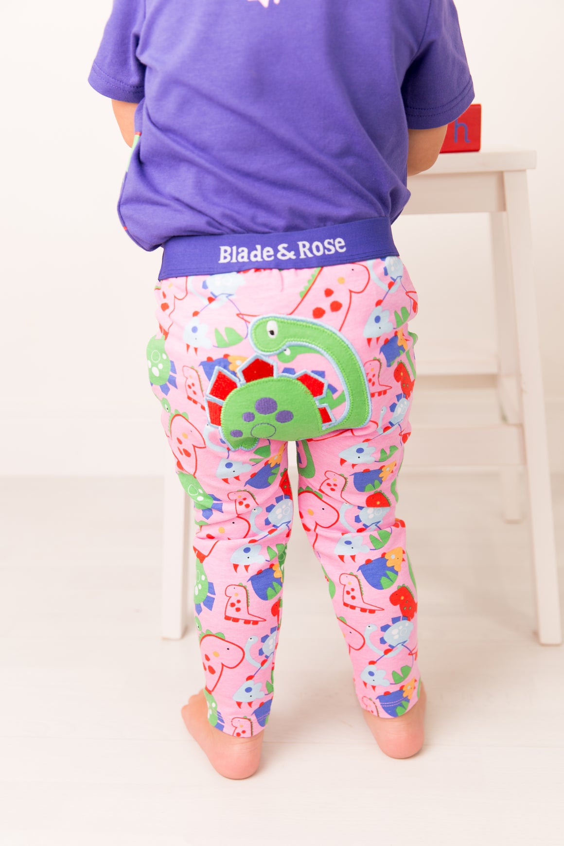 Blade and Rose Bright Dino Summer Leggings which are Beautiful and bright pink with a funky dino design.