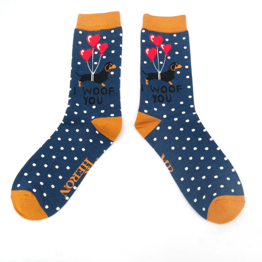navy ankle socks with white spots and a being held up by three red balloonsn orange trim with a dachsund