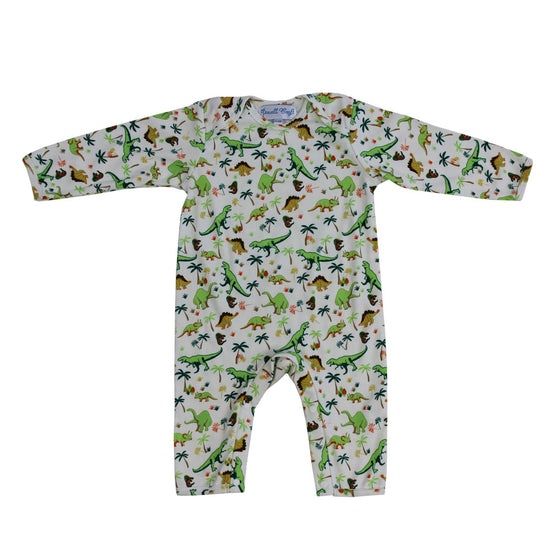 Powell Craft Dinosaur Print Baby Jumpsuit with long sleeves and legs and a dinosaur print with trees against a cream background