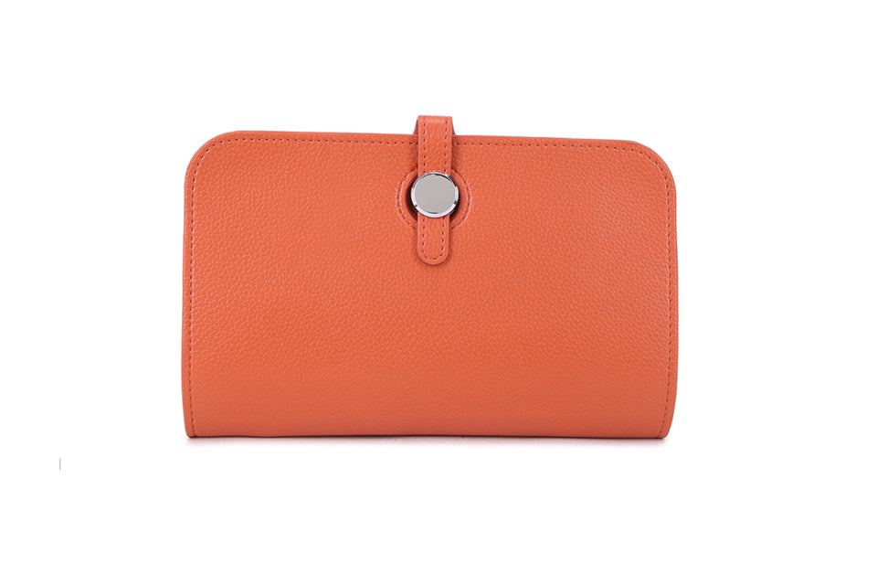 orange leather purse with silver fastener with a removable card wallet