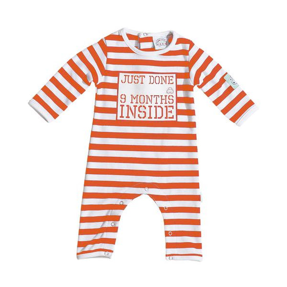 Lazybaby organic baby grow  with orange and white stripes and text on the front saying 'just done 9 months inside'