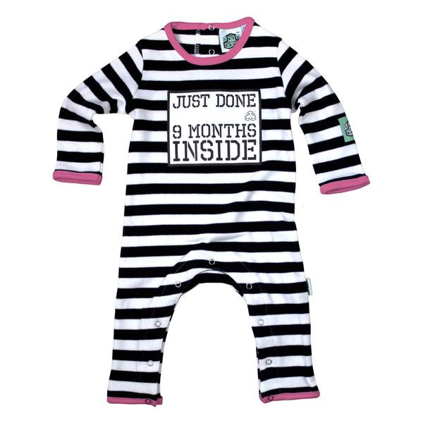 LazyBaby Organic Babygrow with black and white stripes, pink trim and text saying 'just done 9 months inside'