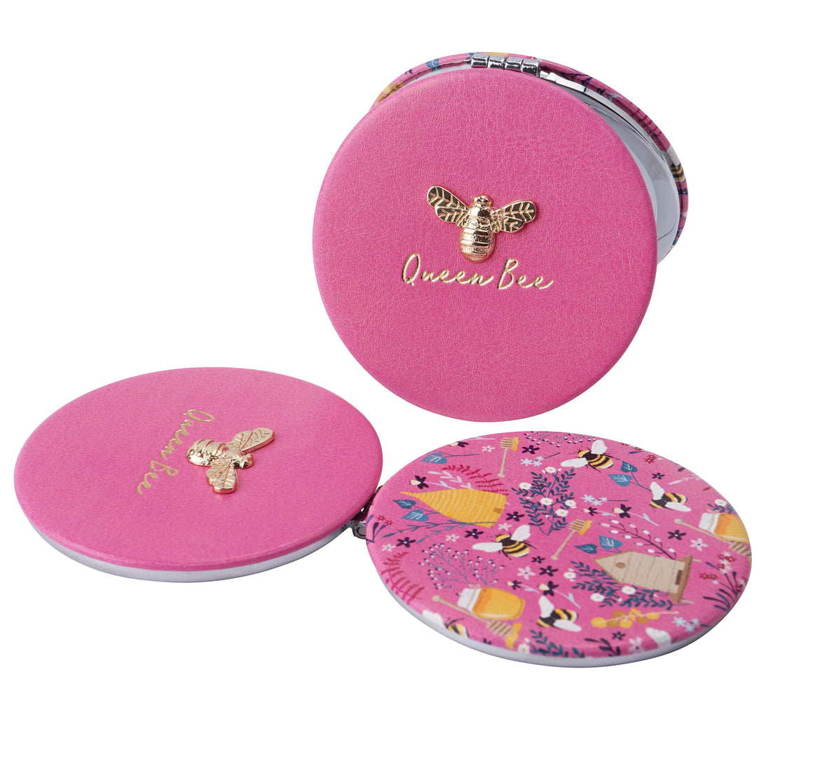 pink circular compact mirror. double sided with one side decorated with a gold bee and text saying 'queen bee' and the other side with a bee print featuring honey and a purple floral design