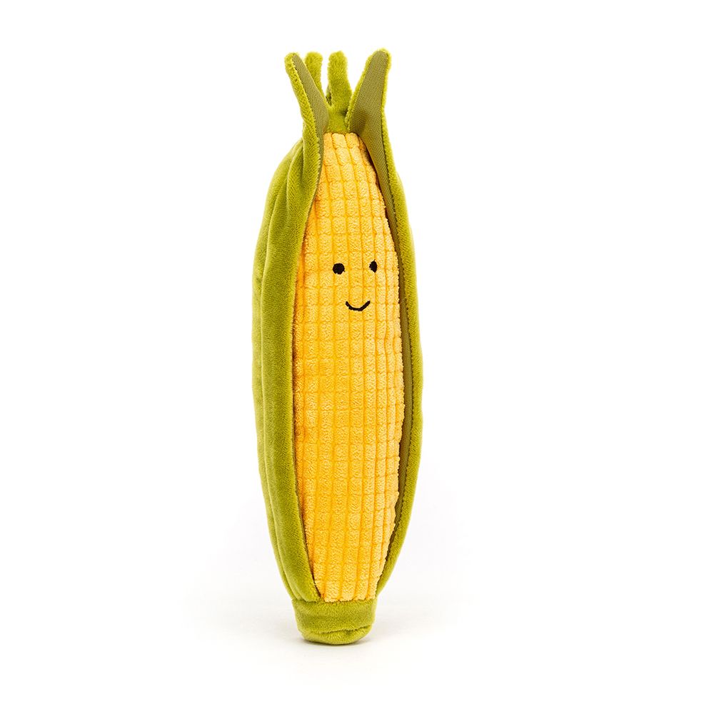 a bright yellow corn with a smiley face in a green husk